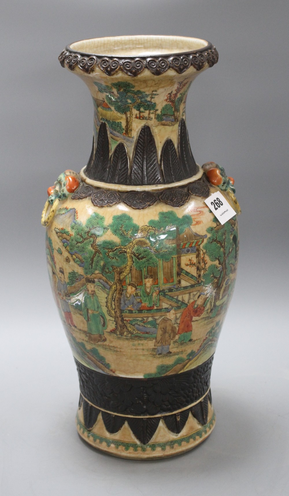 A late 19th century Chinese crackle glaze vase, decorated with figures in a continuous landscape, height 46cm